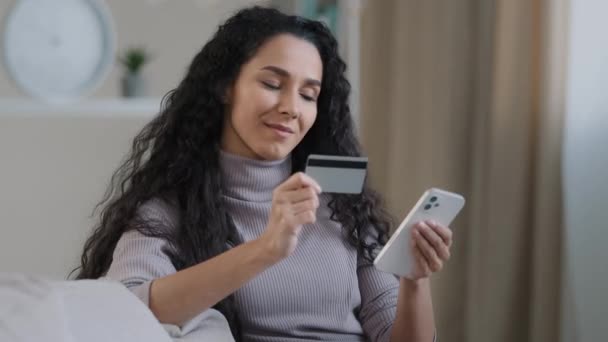 Smiling Young Hispanic Woman Hold Phone Credit Card Happy Girl — Stockvideo