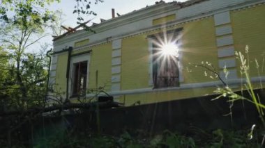 Kharkiv region, Skovorodinovka, Skovorodinivka, Ukraine - 05.09.2022: Bombed historical house destruction broken burnt roof due to russian terror murder result of military invasion in Kharkov region