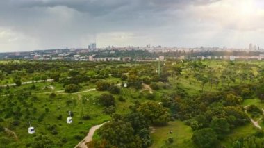 Aerial view of famous park former hunting forest Spain cableway suspension road gives tourists opportunity to over city and admire beauties one most historic green parts Madrid spectacular landscape