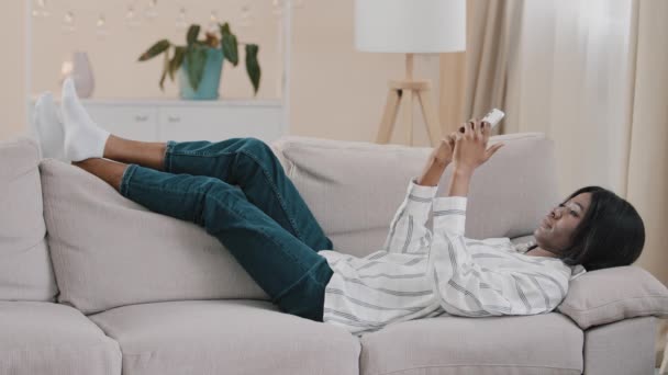 Relaxed Carefree Young Calm Woman Lying Comfortable Couch Cozy Living — Wideo stockowe