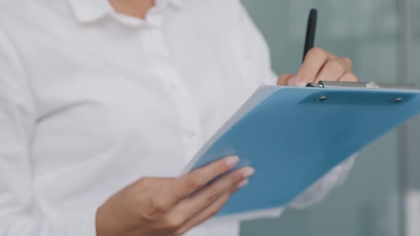 Close Unrecognizable Female Secretary Manager Hold Pen Makes Notes Writes — Vídeos de Stock
