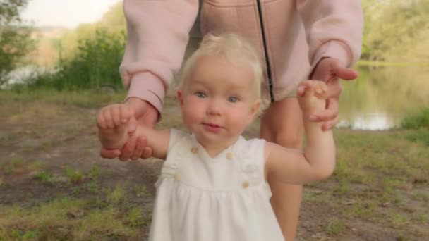 Close Little Caucasian Smiling Baby Girl Infant Toddler Child Kid – stockvideo