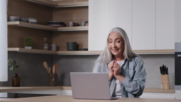 Excited Middle Aged Senior Woman Winner Amazed Businesswoman Sits Kitchen — Video Stock