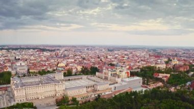 Aerial view popular tourist destination capital city of Spain Madrid large historic Royal Palace complex famous buildings and official residence of Spanish royal family main attraction for travelers