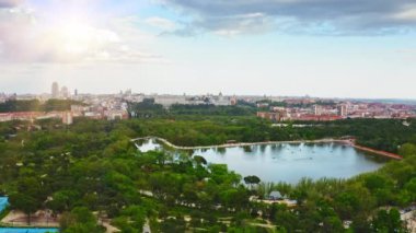Aerial view of beautiful green natural landscape of central park blue Lake in Madrid capital of Spain official residence of Spanish royal family famous tourist destination attraction for travelers