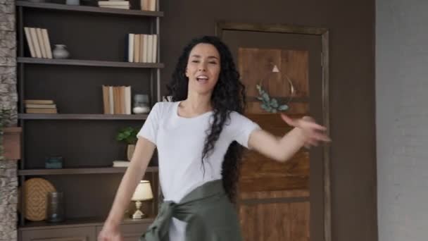 Young Happy Energetic Hispanic Woman Dancing Merrily Favorite Music Home — Vídeos de Stock