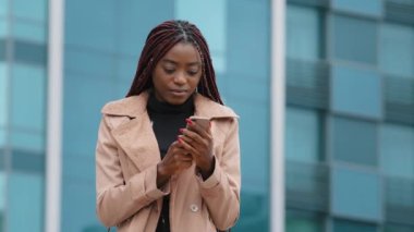Upset frustrated young woman receiving email reading bad news on smartphone receives notice disapproval bank loan failed exam unpaid tax refusal to get new job sad unhappy girl feeling upset despair
