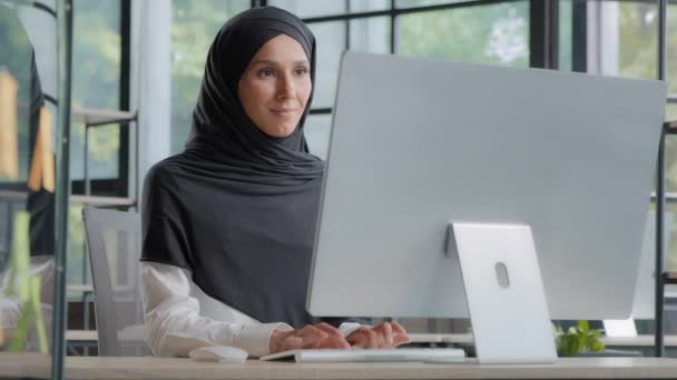 Confident Arab Businesswoman Manager Working Office Typing Keyboard Looks Monitor — Stockvideo