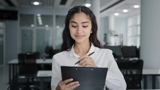 Young Woman Secretary Writes Details Task Writing Data Clipboard Makes — Vídeos de Stock