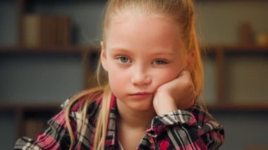 Close up portrait little offended child sad upset bored preschool girl pretty blonde female kid look at camera sit at home alone sweety daughter feel sadness after quarrel punishment for bad behavior