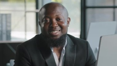 Webcam view video call intelligent african american businessman male teacher university professor expert sit at office talk at camera teaching record educational course online for students colleagues