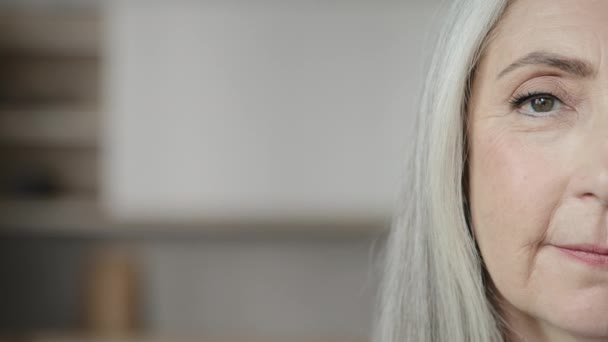 Close Human Half Face Mature Caucasian Woman Calm Grey Haired — Video Stock