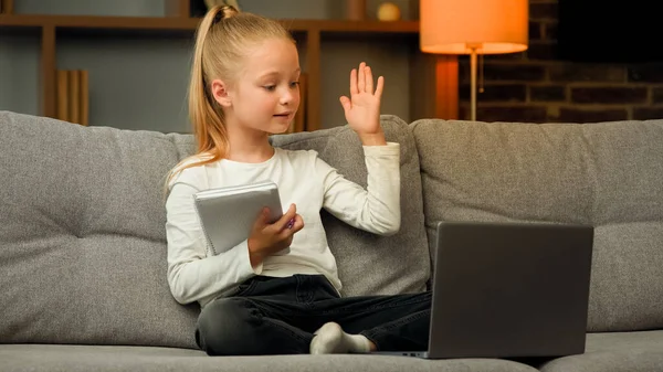 Blonde Little Smart Schoolgirl Pupil Listen Educational Lesson Laptop Home — Stockfoto