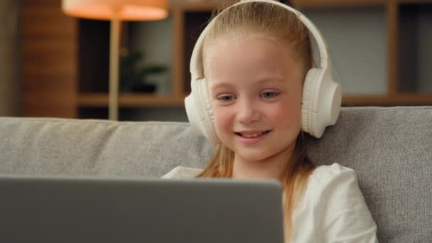 Beautiful Kid Child Little Gamer Studying Online Laptop Home Listen — Stock Video