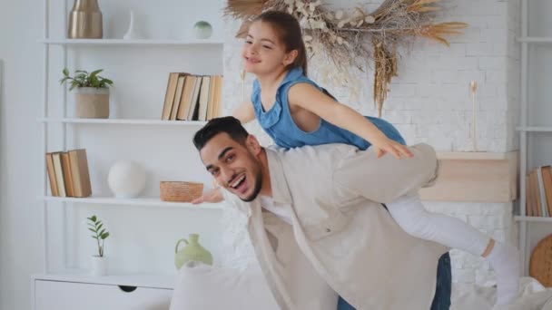 Funny Hispanic Indian Man Loving Father Dad Holds Back Little — Stock Video