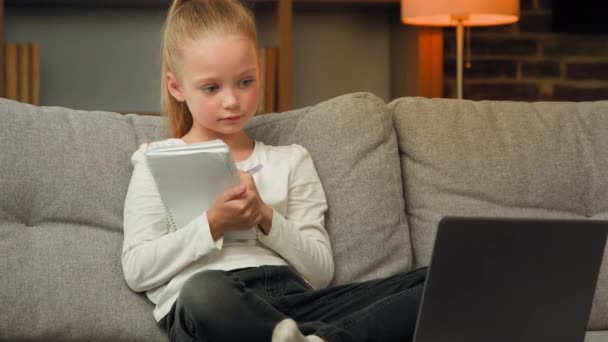 School Child Caucasian Girl Study Online Laptop Sitting Sofa Home — Wideo stockowe