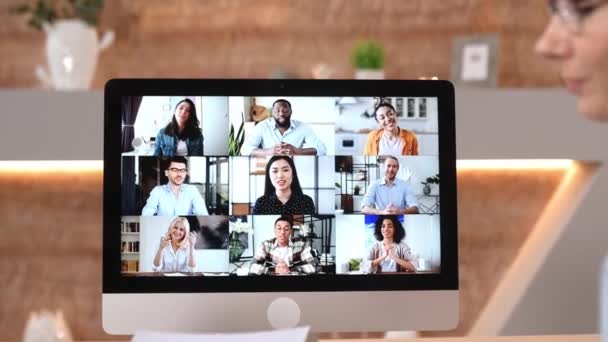 Successful creative business partners gathered in an online video conference to discuss the companys financial plans. Business man and woman talking on video call with colleagues, analyzing strategy — Stok video