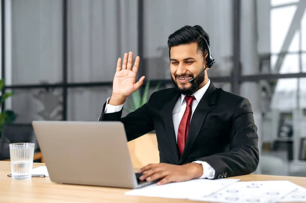 Positive Successful Indian Arabian Man Suit Headset Business Advisor Call — ストック写真