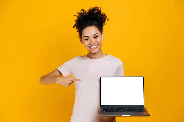 Pleased African American Young Woman Holding Open Laptop Blank White — Stockfoto