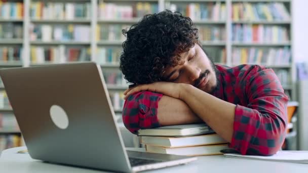 Tired Bored Arabian Indian University Student Sleeping While Sitting Desk — Vídeo de stock