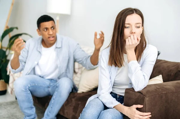 Mixed Race Couple Sitting Sofa Living Room Angry Man Yells — Stock Fotó