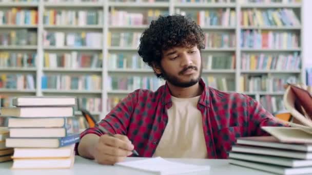 Back School Indian Arabian Bored Tired Male Student Sitting Table – Stock-video