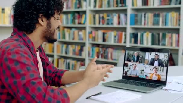 Online Video Conference Smart Successful University Male Student Sits Library — Wideo stockowe