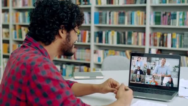 Guy Student Studying Remotely Smart Arabian Indian Stylish Guy Sitting — стоковое видео