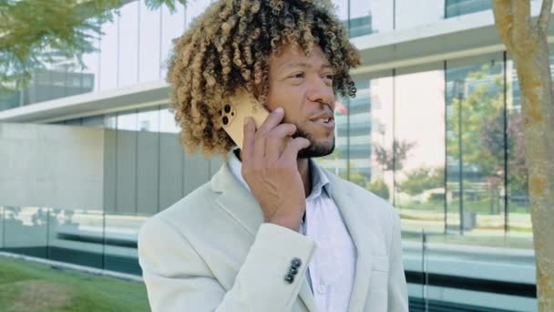 Positive Busy African American Brazilian Curly Haired Man Wearing Stylish — Stockvideo