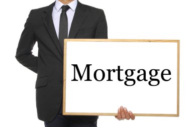 Vücut beyaz bir tahta tutuyor.