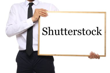 Vücut beyaz bir tahta tutuyor.