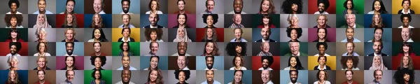 Schöne glückliche Menschen vor einem Hintergrund — Stockfoto