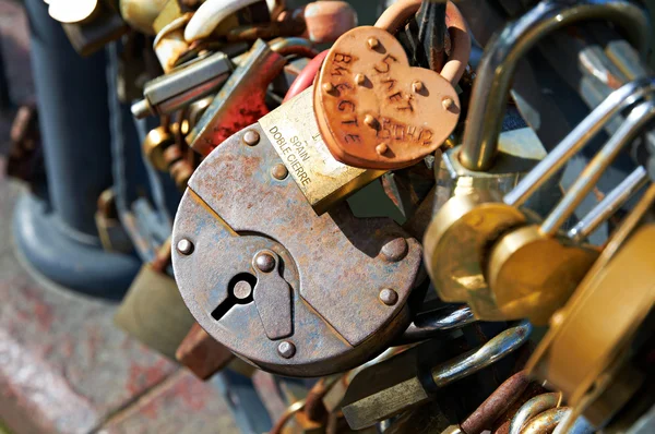 Many Love locks on the bridge — Stock Photo, Image