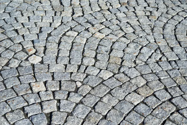 Pietre grigie pavimentazione come sfondo — Foto Stock