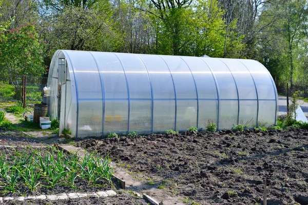 Greenhouse in garden — Stock Photo, Image