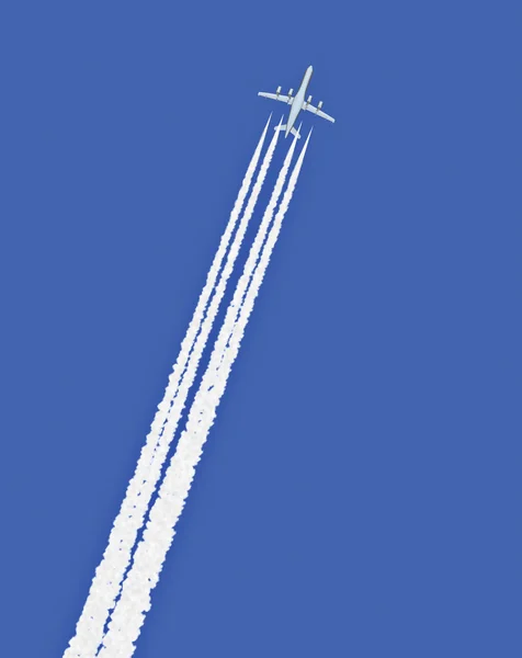 Jet airplane with trail — Stock Photo, Image