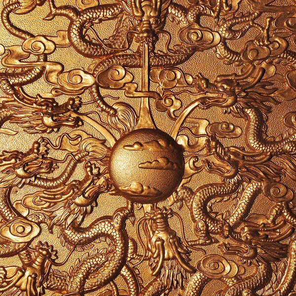 Gold dragon around the gold marble — Stock Photo, Image