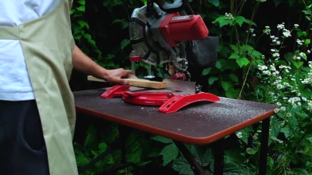 Garden Young Man Cuts Board Miter Saw Slow Motion High — Stockvideo