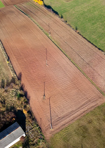 Vista aérea da paisagem do campo de colheita — Fotografia de Stock