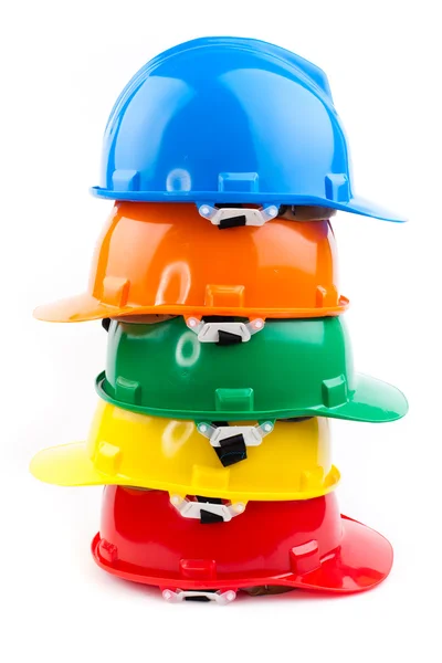 Casques colorés isolés sur fond blanc — Photo