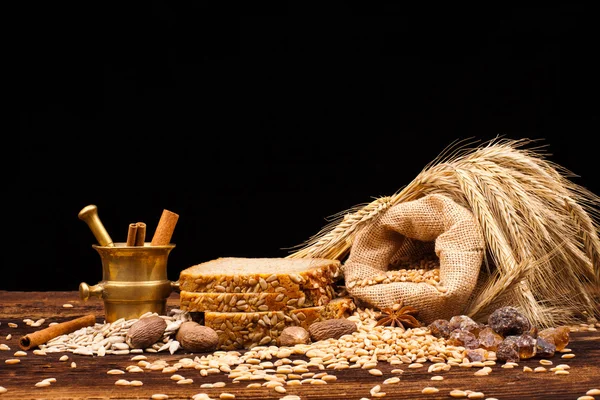 Baked bread on wooden table — Stock Photo, Image