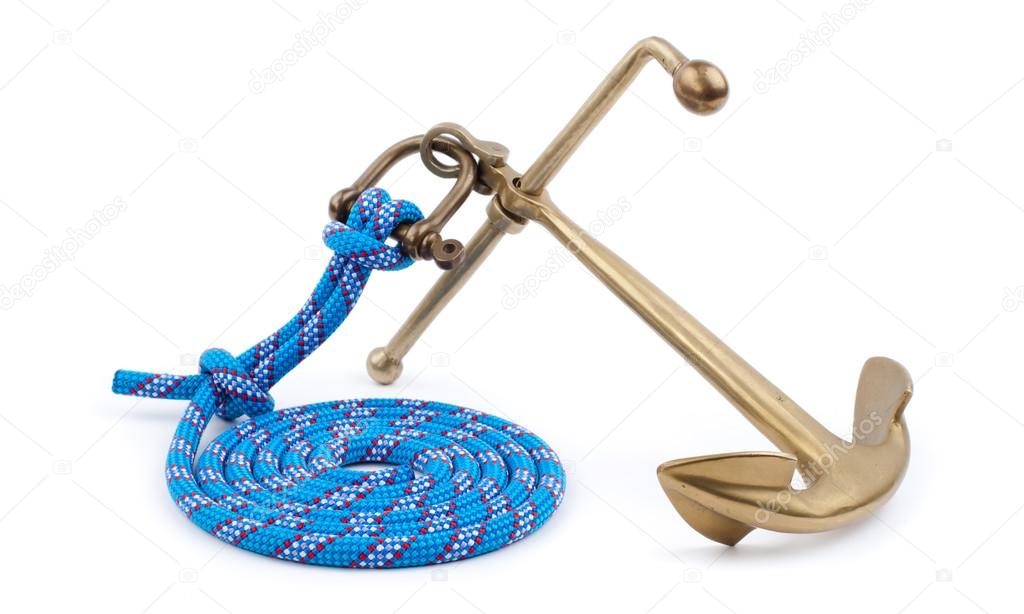 Old marine anchor and blue rope