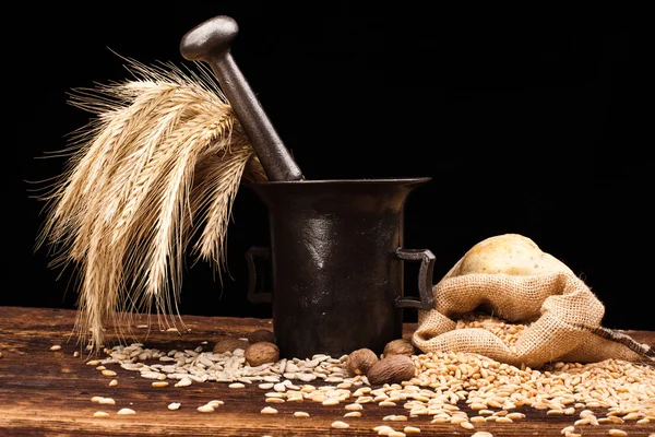 Baked bread, mortar and wheat — Stock Photo, Image