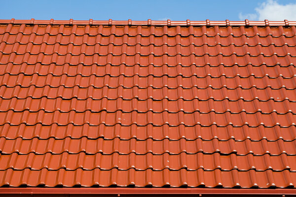 Red roof with blue sky