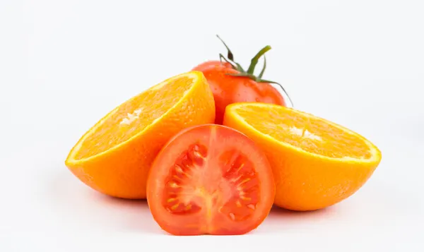 オレンジ色の果物やトマト — ストック写真