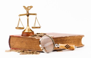hukuk kitabı, para, Büyüteç ve adaletin terazisi