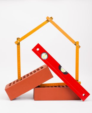 tuğla ve ev sembolü