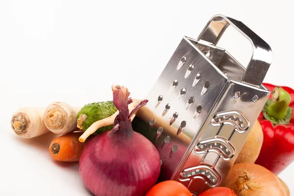 Vegetables and grater — Stock Photo, Image