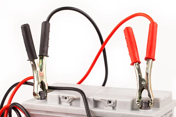 Car battery and jumper cables — Stock Photo, Image