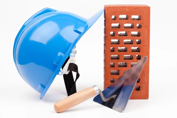 Hardhat brick and mason trowel — Stock Photo, Image